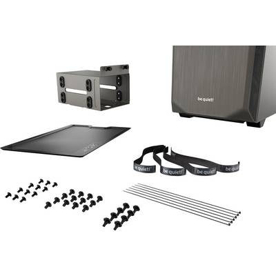 Computergehäuse-Starterkit mit Gehäuse, Festplattenrahmen, Schrauben, Kabelbindern und einem Gehäusedeckel. Markenname 'be quiet!' sichtbar.