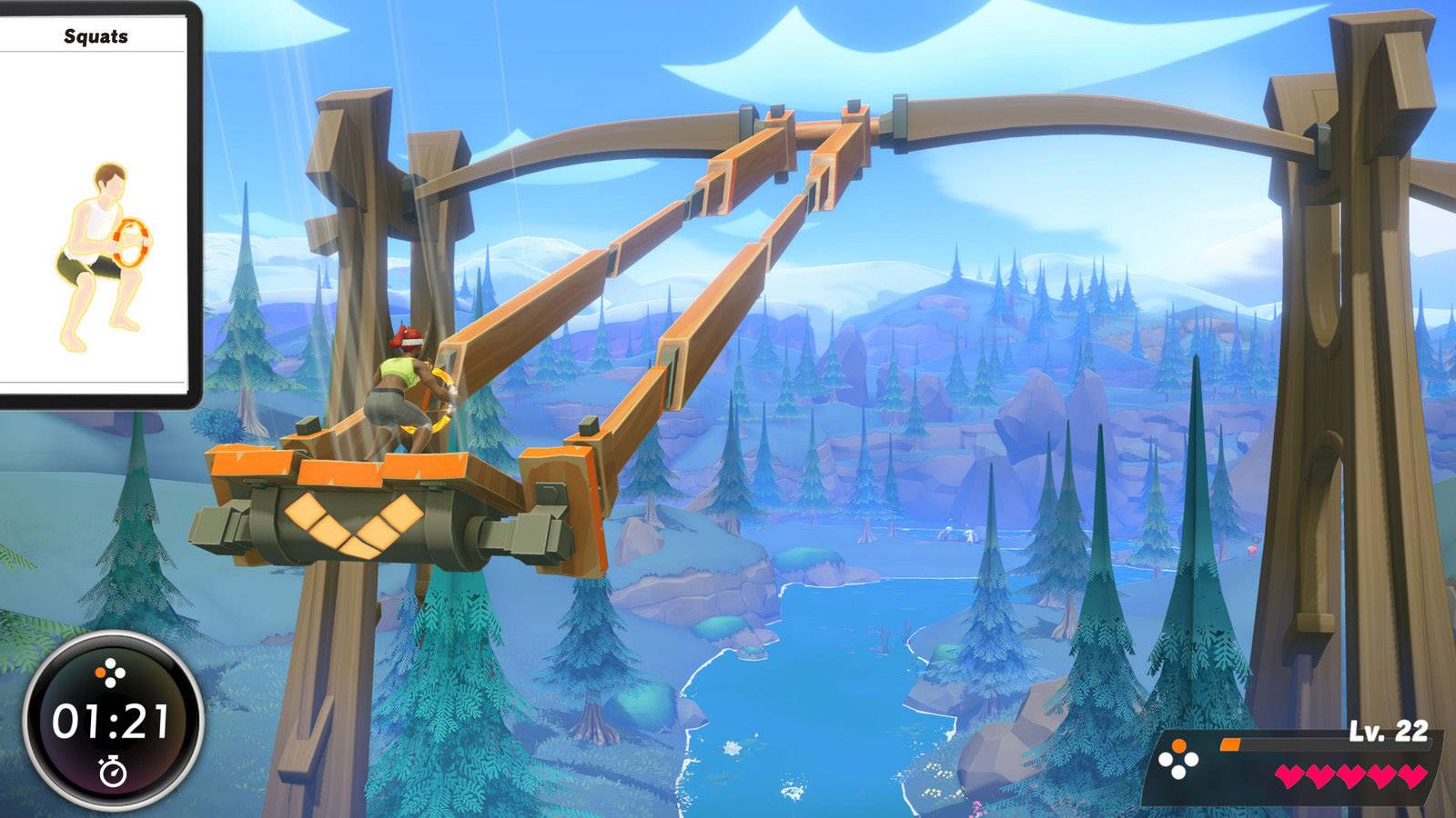 Ein Charakter sitzt auf einem Schlitten, der an einem Seil über eine bewaldete Landschaft fährt. Unten links zeigt ein Timer 1:21 an.