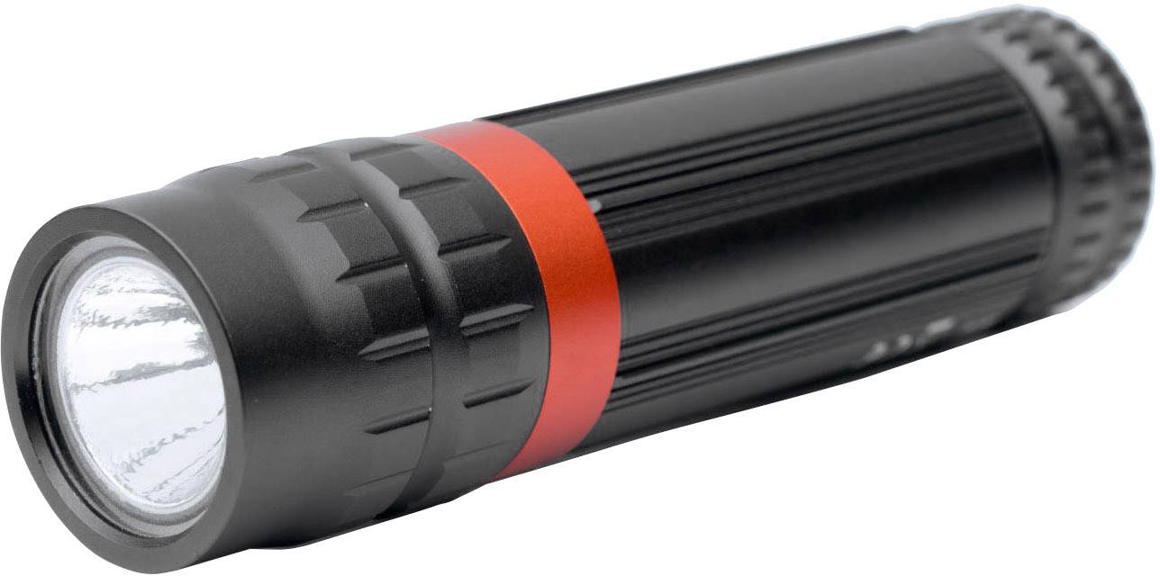 Eine schwarze Taschenlampe mit rotem Ring, eingeschaltet, zeigt hell. Sie liegt seitlich und zeigt nach links vorne.