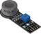 'Foto eines MQ-7 Gassensors. Der Sensor hat ein zylindrisches Gehäuse, ist auf einer Platine montiert und verfügt über einen blauen Potentiometer.'