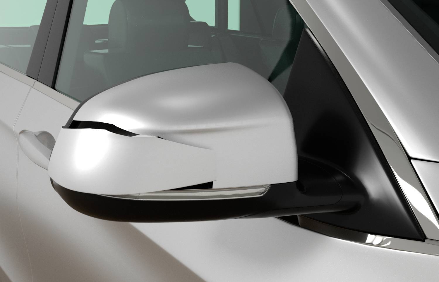 Eine Nahaufnahme eines zerkratzten und leicht beschädigten Seitenspiegels eines Autos, der auf einer aschgrauen Fahrzeugtür montiert ist.