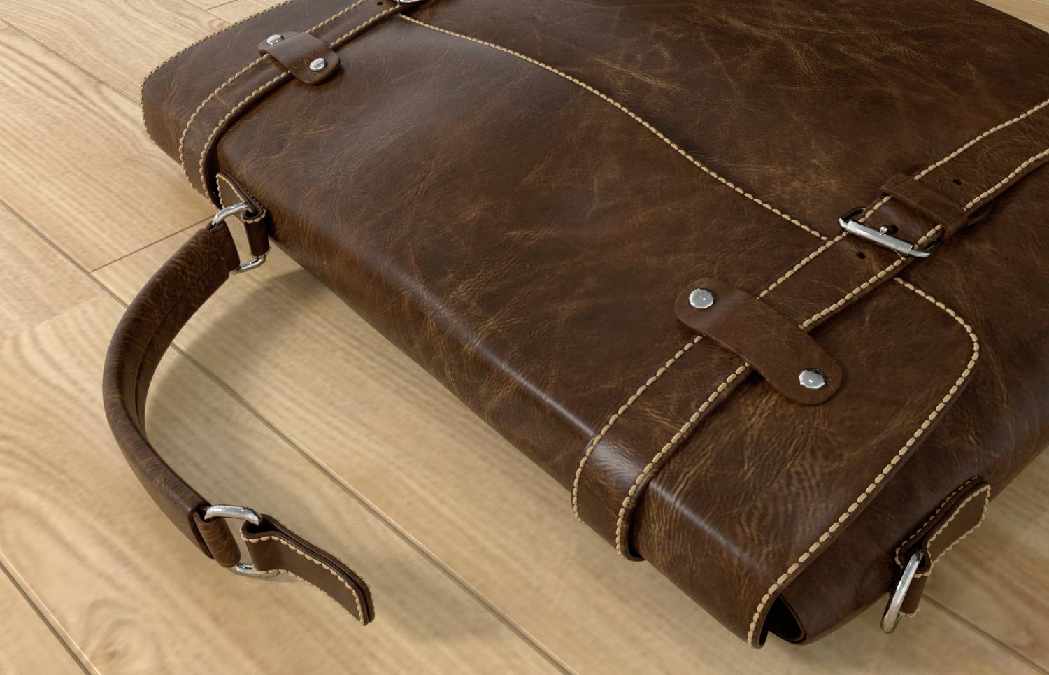 Braune Ledertasche mit Schnallen und Griff auf einem Holzboden. Die Tasche hat Ziernähte und Metallelemente.