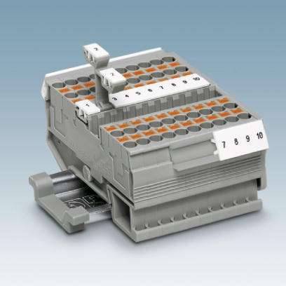 Grau-orange Klemmenblock mit nummerierten Anschlüssen von 1 bis 10, für elektrische Verbindungen. Rechteckige Bauform, auf Montageband.