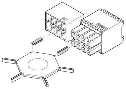 Zeichnung eines modularen Steckverbindersystems mit sechseckiger Basisplatte und zwei Steckverbindern, die zur Montage ausgerichtet sind.