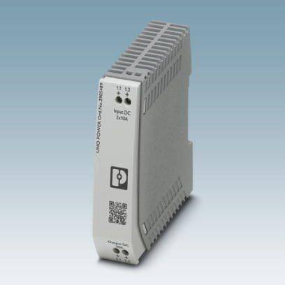 Ein silbernes Schaltnetzteil mit der Aufschrift 'Input DC 2x10A'. Es hat einen QR-Code und zwei LED-Anzeigen für Statusinformationen.