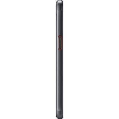 Seitenansicht eines schwarzen Mobilgeräts mit orangefarbenem Akzent, schmal und elegant gestaltet.