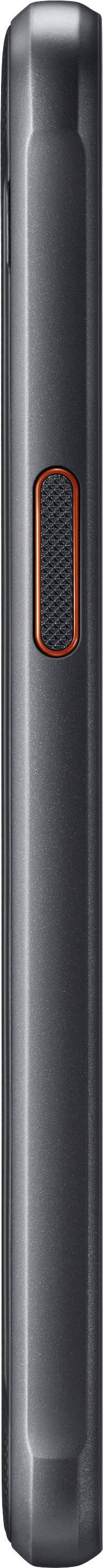 Ein seitlicher Blick auf ein schwarzes Mobiltelefon mit einem roten Knopf in der Mitte.