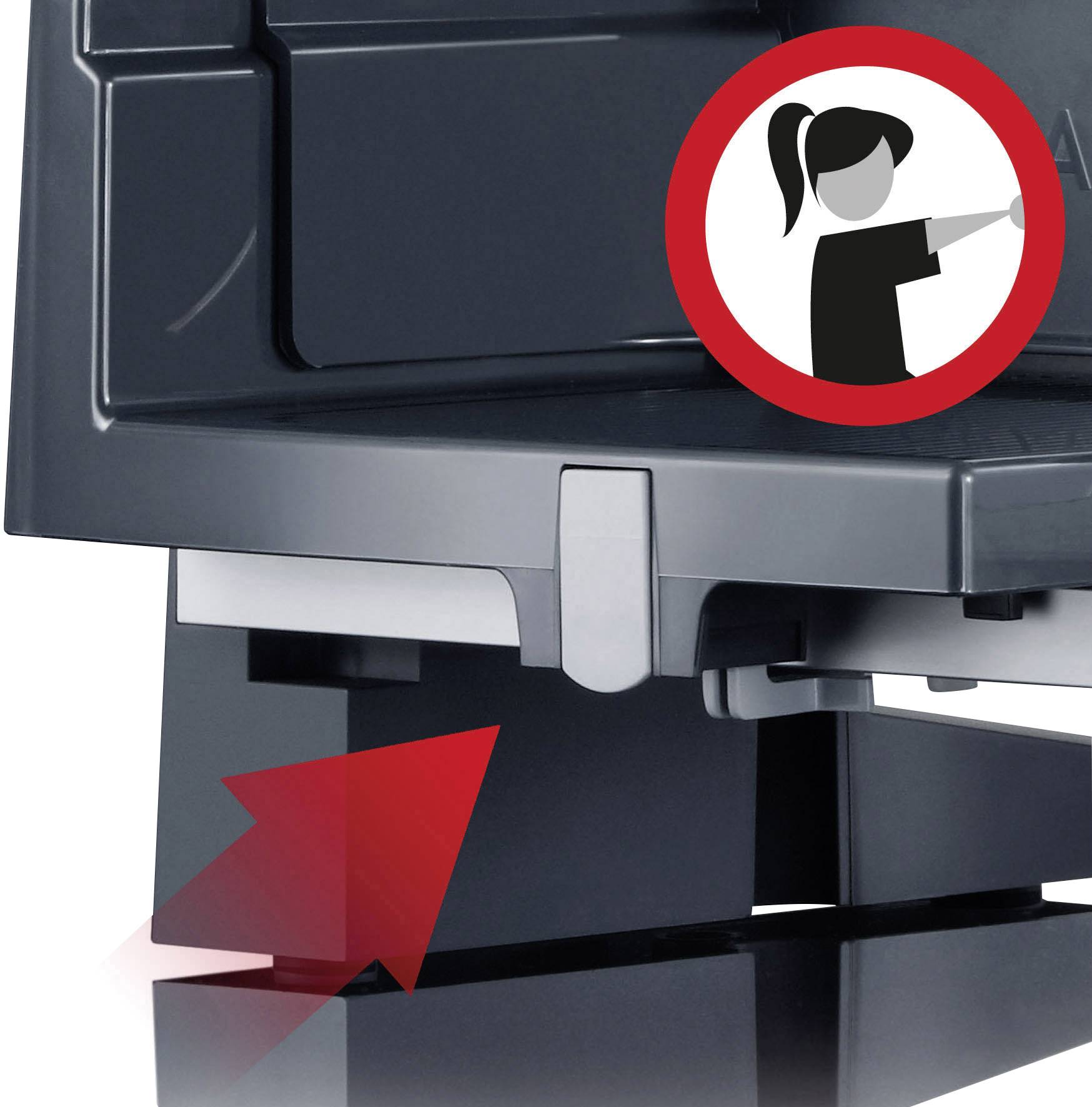 Abbildung zeigt eine graue Maschine mit einem roten Sicherheitszeichen, das eine Figur mit erhobenem Arm darstellt. Ein roter Pfeil weist auf einen unteren Bereich der Maschine hin.