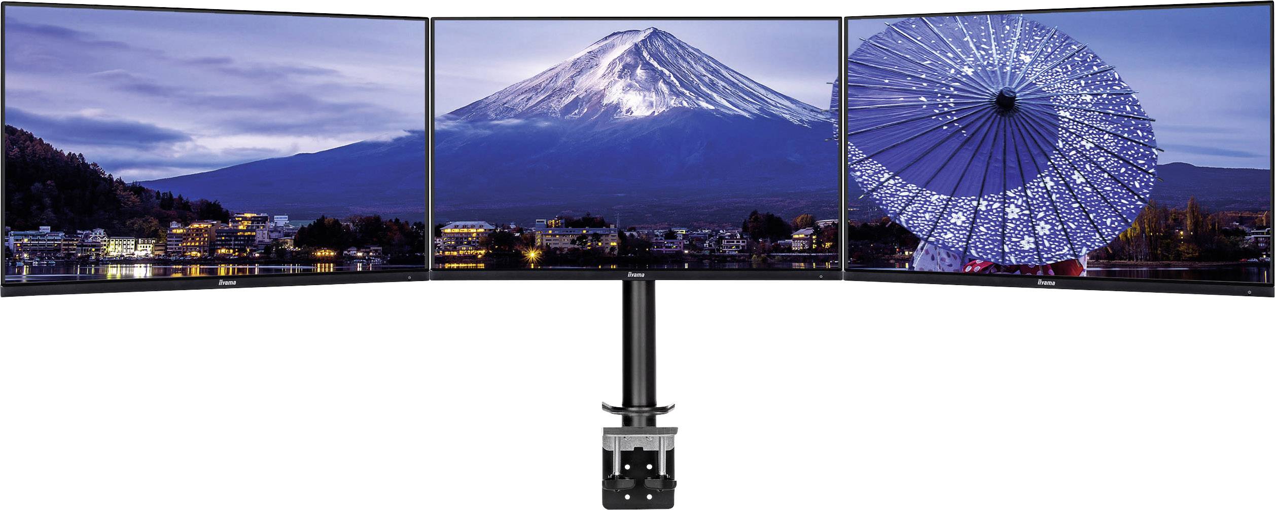 Drei nebeneinanderstehende Monitore zeigen eine Landschaft mit dem beleuchteten Berg Fuji und einer leuchtenden japanischen Pagode bei Nacht.