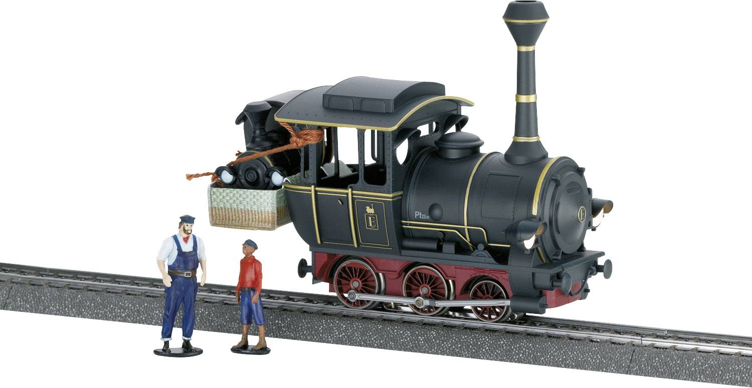 Spielzeuglokomotive auf Schienen mit zwei Figuren. Eine Lokführerfigur steht neben einer zweiten Figur, die kindlich erscheint.