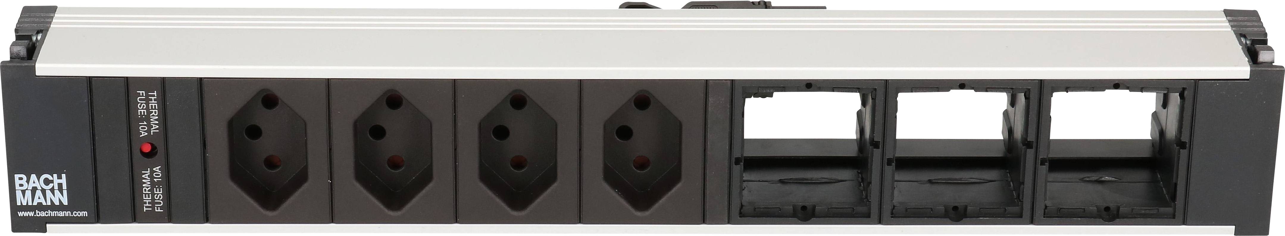 'Bachmann Steckdosenleiste mit vier Steckplätzen und vier leeren Modulrahmen, geeignet für modulare Elektroinstallationen.'