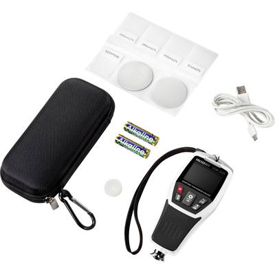 Ein digitales Lichtmessgerät mit Zubehör: Hartschalenetui, vier Kalibrierungsscheiben, USB-Kabel und zwei AAA-Batterien.