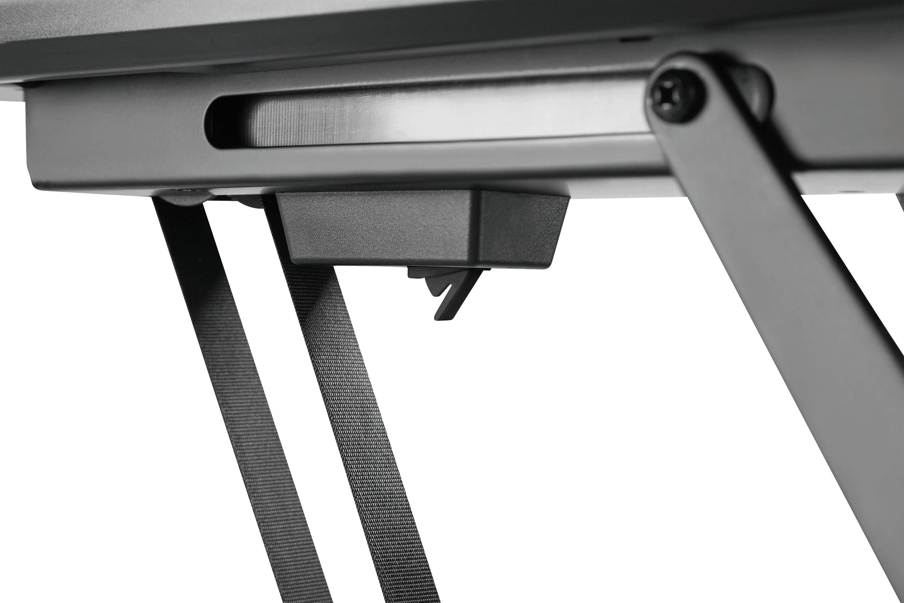 Schwarz-graue Metallverbindung unter einem Tisch mit Beinen in V-Form.