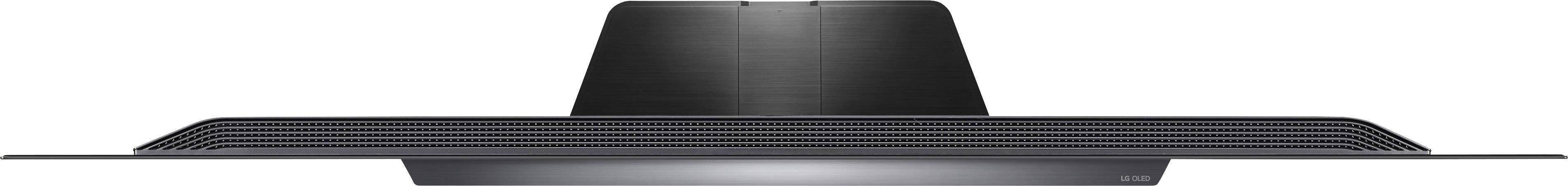 'Rückansicht eines schwarzen Computerbildschirms mit Lüftungsschlitzen.'