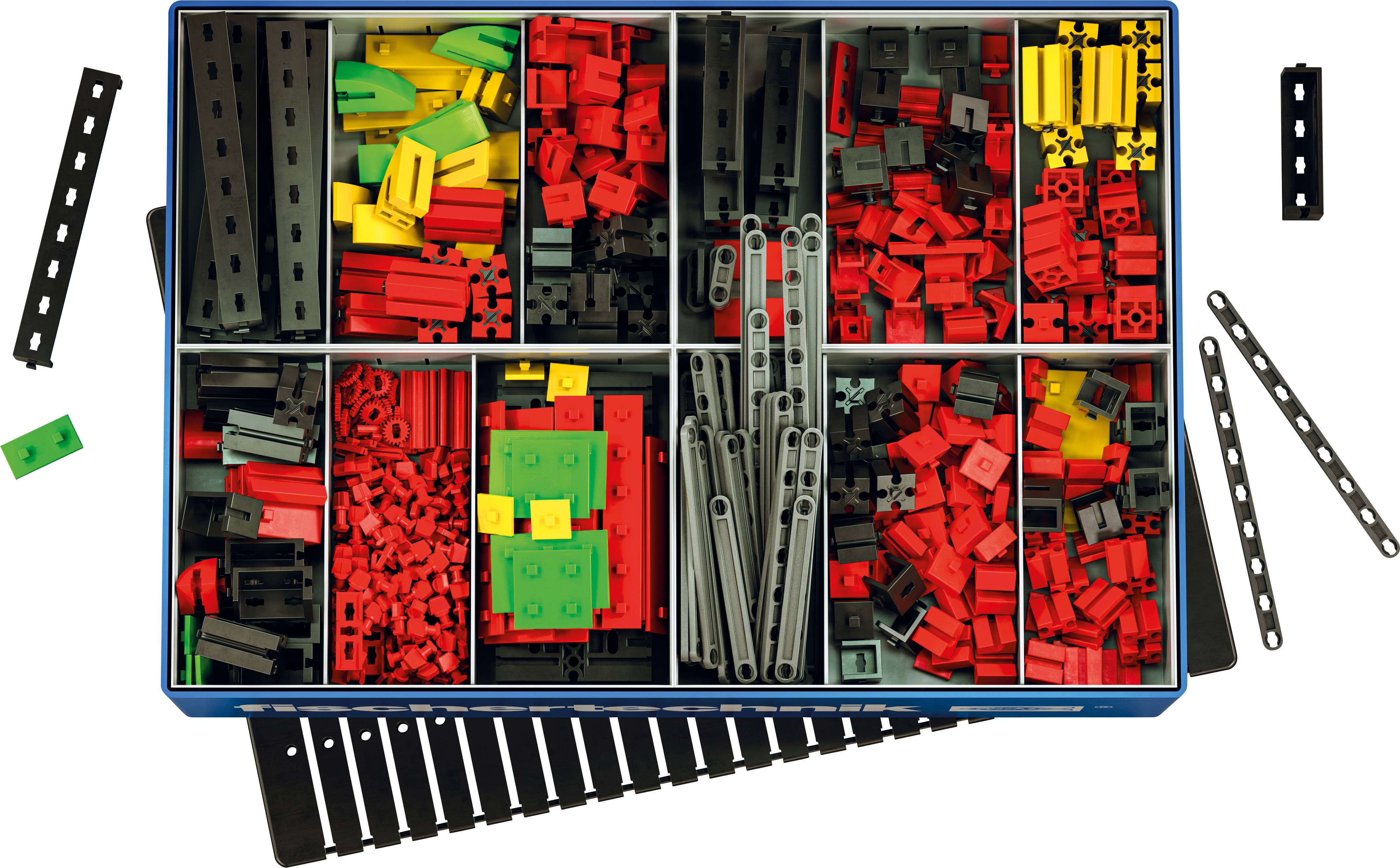 Ein Sortimentskasten mit verschiedenfarbigen Kunststoffbausteinen und Verbindungsstücken, hauptsächlich in Rot, Grün, Gelb und Schwarz.