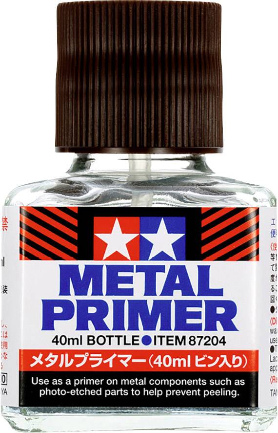 Kleine Flasche mit braunem Deckel, Etikett mit 'Metal Primer' und Anweisungen zur Anwendung als Grundierung für Metallteile.