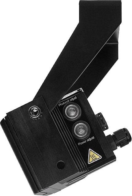 Ein schwarzer Sensor mit Beschriftungen 'Prozess aktiv' und 'Leistung ein'. Kompakte Bauweise mit gelbem Warnsymbol unten rechts.