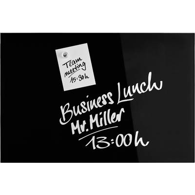 Schwarzes Brett mit Notizen: 'Team meeting 15:30h' und 'Business Lunch Mr. Miller 13:00h'.