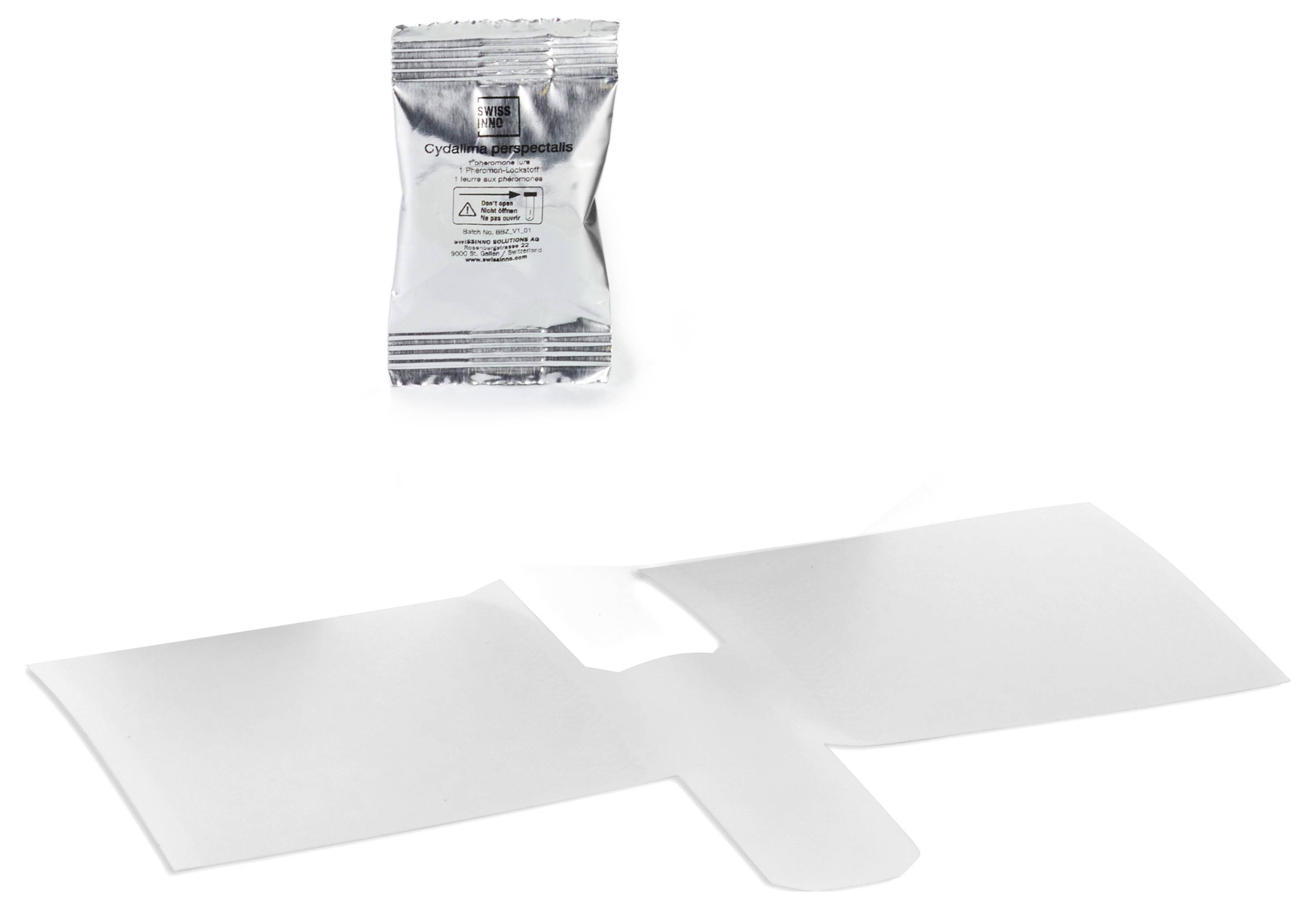 Ein silberner Beutel mit der Aufschrift "Cycloheximid" und eine ausgebreitete weiße sterile Verpackung.