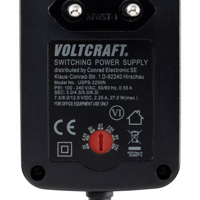 Ein schwarzes Netzteil von Voltcraft mit Modellnummer USPS-2250N. Es hat mehrere Ausgangsspannungen und ist für Büroeinsatz.
