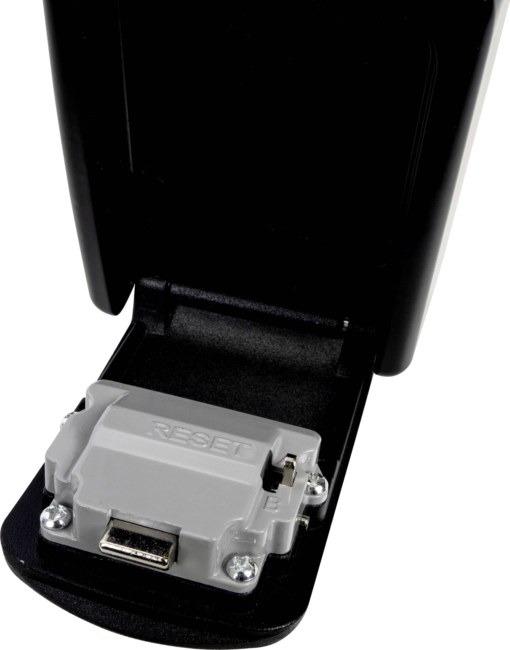 Ein DVD-Laufwerk mit geöffneter Klappe zeigt einen Reset-Schalter und einen USB-Anschluss darunter.