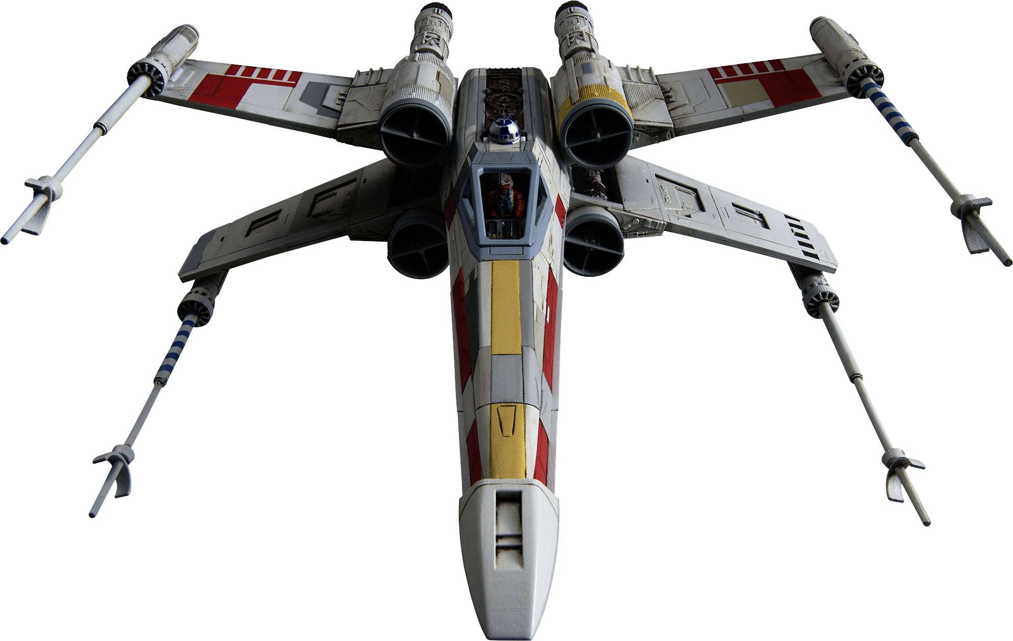 Raumschiff mit kreuzförmigen Flügeln und roten Markierungen, von vorne gesehen, mit Cockpit und kleinem Roboter auf der Oberseite.