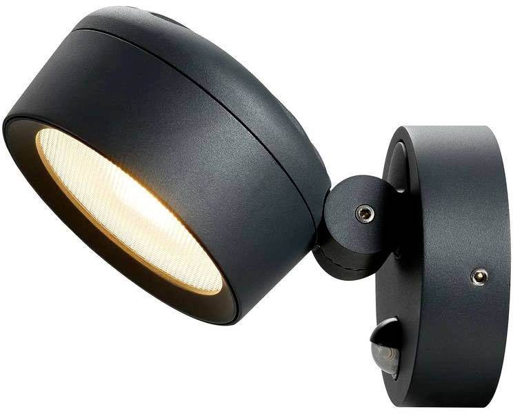 Schwarze, runde Wandlampe mit verstellbarem Kopf, leuchtend. Ideal zur Ausleuchtung von Räumen oder Akzentuieren bestimmter Bereiche.