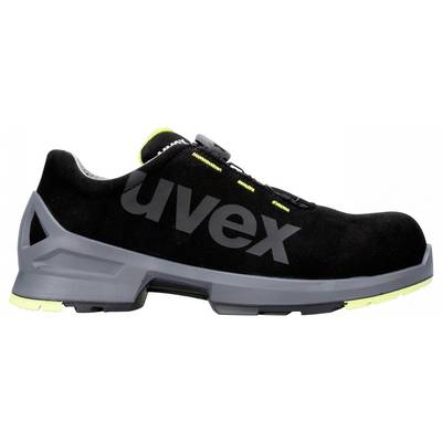Schwarzer Sicherheitsschuh mit grauer Sohle und gelben Details. Der Schuh hat eine große Aufschrift 'uvex' auf der Seite.