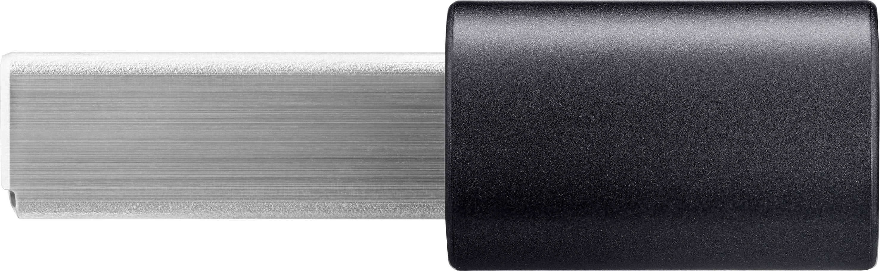 Ein USB-Stick mit schwarzer Kappe und silbernem Anschluss liegt horizontal.