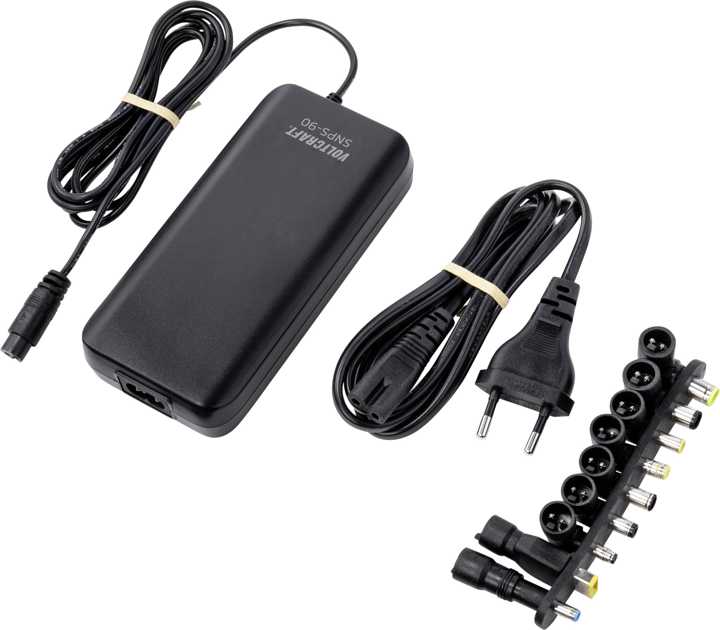 Schwarzes Netzteil mit EU-Stecker und verschiedenen austauschbaren Adapterspitzen für unterschiedliche Geräteanschlüsse.