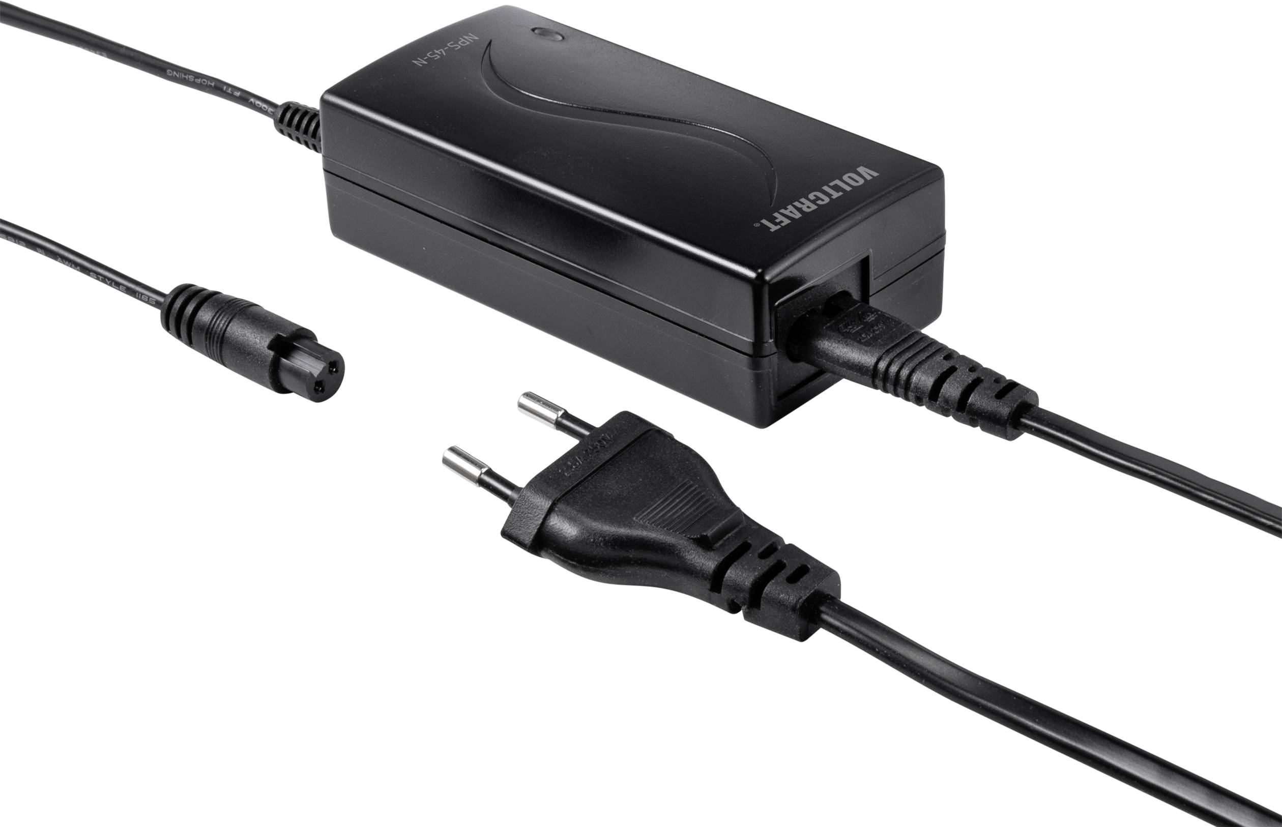 Ein schwarzes Netzteil mit einem Steckdosenkabel und einem Adapterstecker an einem Ende. Es wird zur Stromversorgung elektronischer Geräte verwendet.