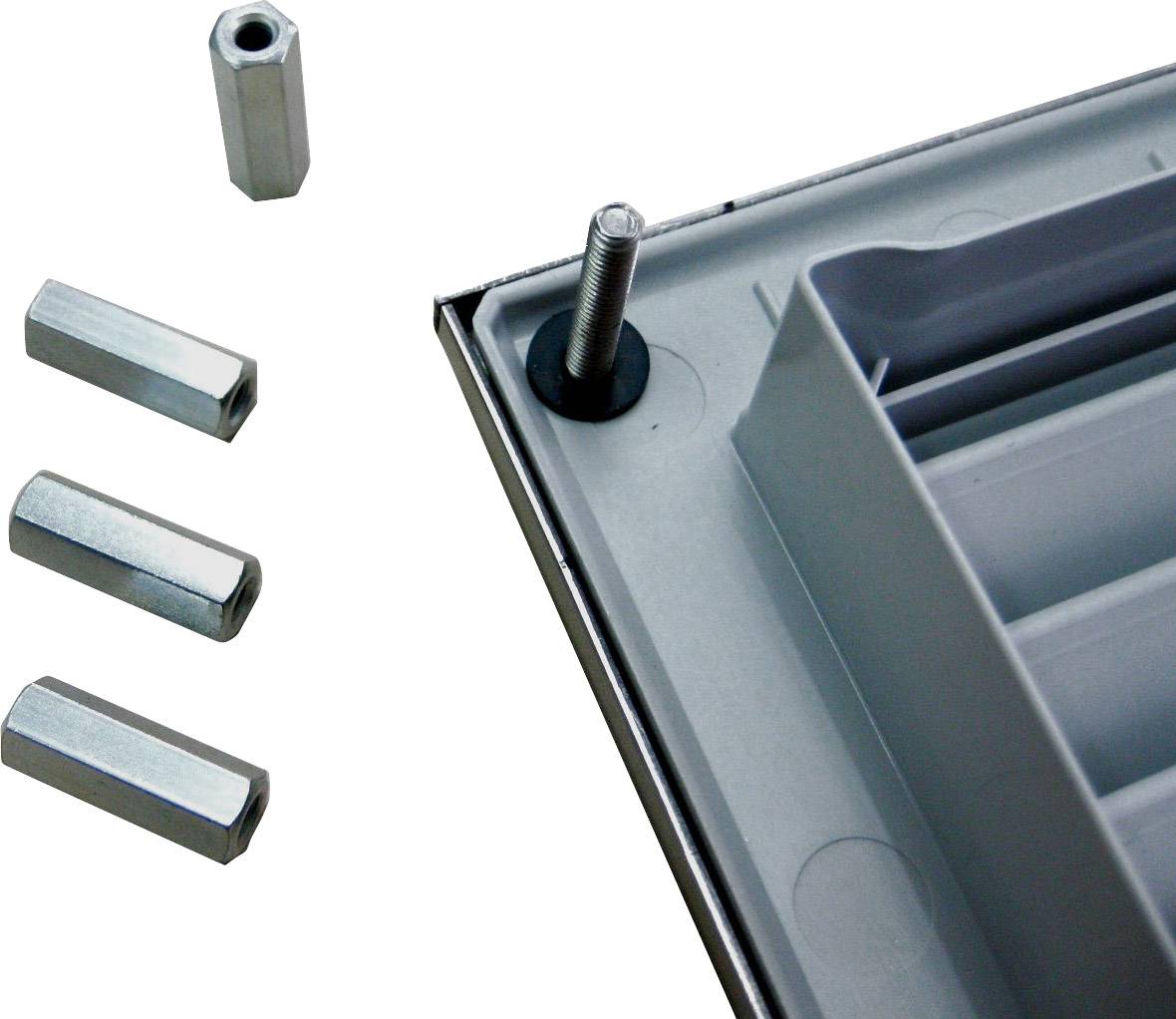 Metallabdeckung mit Schraube und vier Metallschraubkappen daneben, zeigt Montagekomponenten für technische Anwendungen.