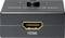 Schwarzer HDMI-Umschalter mit zwei Eingängen auf der Oberseite und einem HDMI-Ausgang auf der Vorderseite.