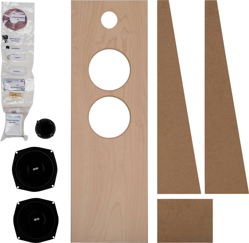 Bausatz für Lautsprecher: Holzplatten mit runden Ausschnitten, zwei Lautsprecher-Einheiten, Kabel und Zubehör in Plastiktüten.