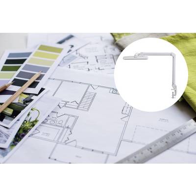 Architekturbaupläne auf einem Tisch mit Farbmustern und einem Lineal. Im Kreis ist eine weiße, verstellbare Tischlampe abgebildet.