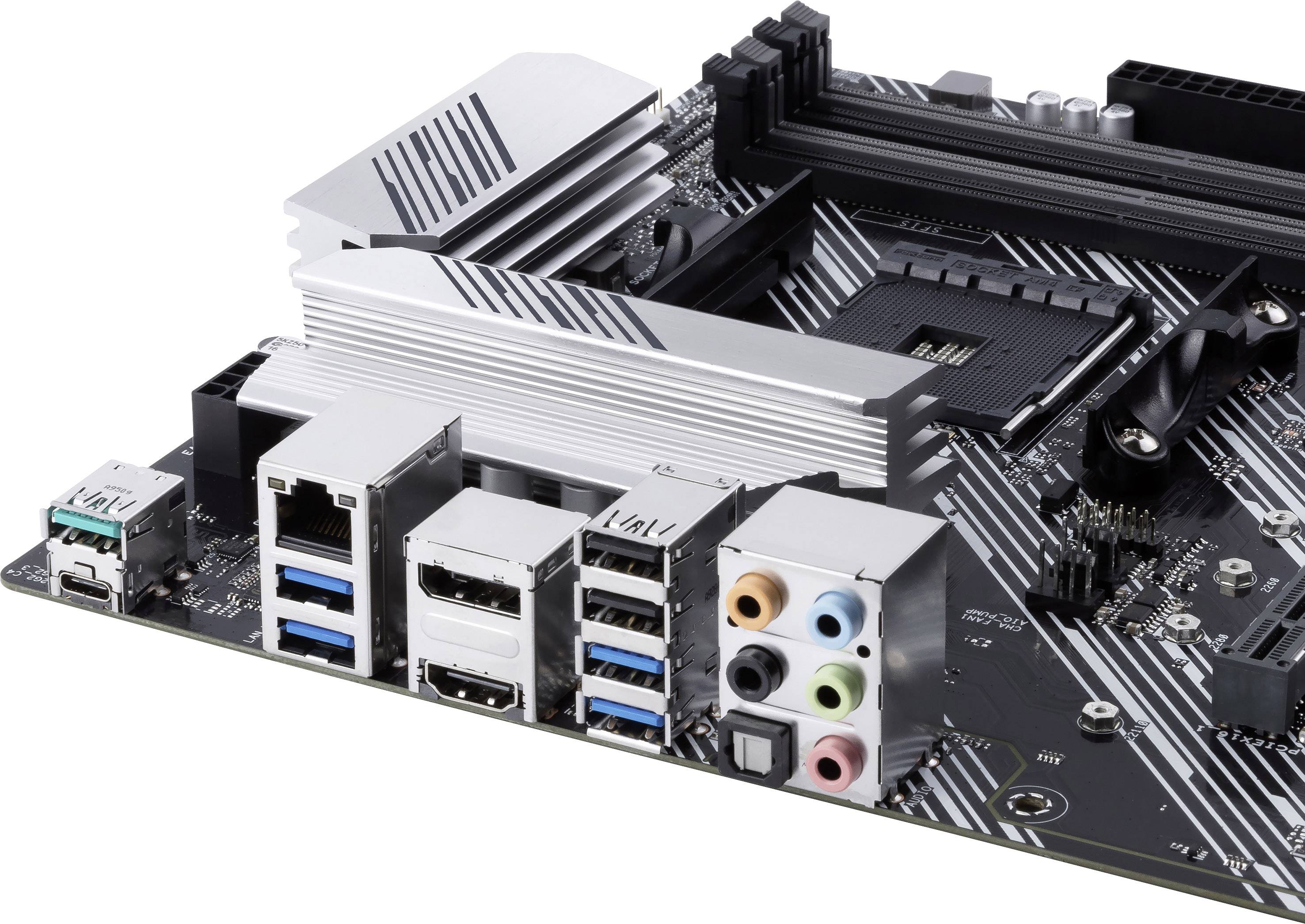 Computer-Mainboard mit USB-Anschlüssen, HDMI und Audiobuchsen. Rechteckige schwarze Komponenten auf einer silbernen Platine.