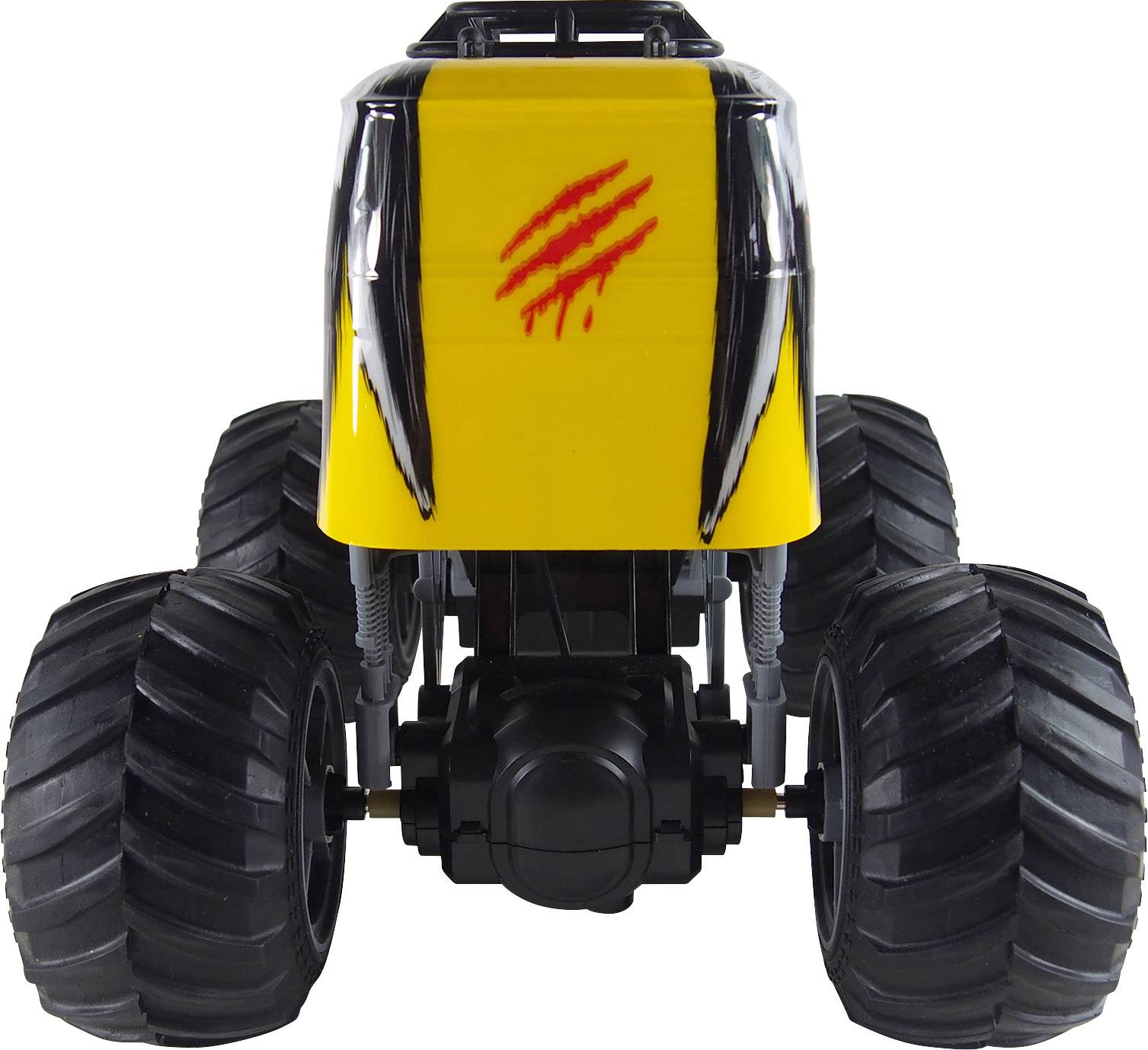 Spielzeug-Monstertruck mit großen schwarzen Reifen und gelbem Körper, verziert mit roten Kratzspuren auf der Vorderseite.