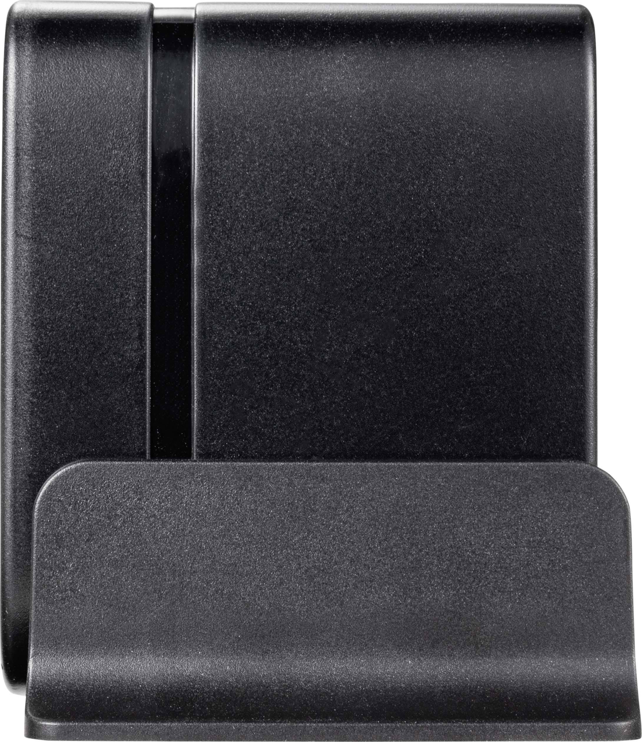 Eine schwarze Kunststoffhalterung, geeignet zum Aufstellen von Mobilgeräten oder Tablets, mit einer stabilen Basis für festen Halt.