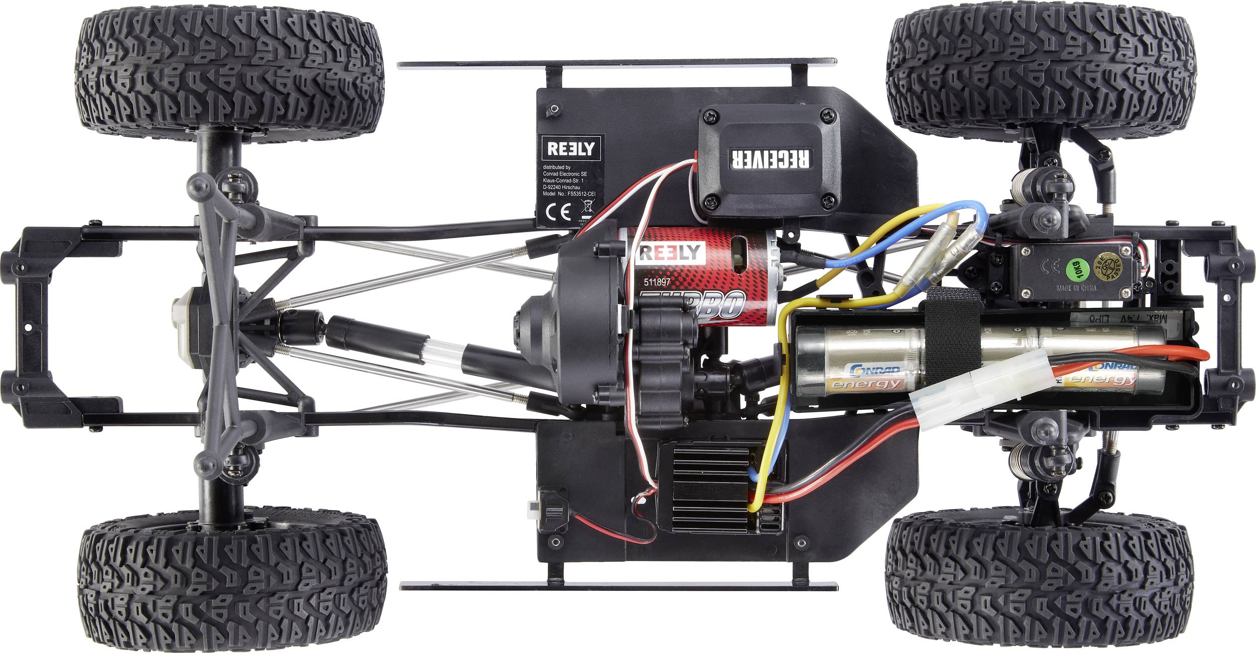 RC-Auto-Chassis von oben, zeigt vier große Gummireifen, sichtbare Verkabelung, Elektromotoren und Aufhängungsteile.