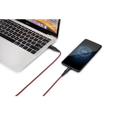 Ein Smartphone wird über ein rotes Kabel an einen Laptop angeschlossen und zeigt einen Ladezustand von 85 % an.
