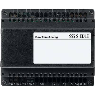 Das Bild zeigt ein schwarzes Siedle DoorCom-Analog-Modul für Türkommunikation, mit Anschlüssen am oberen und unteren Rand.