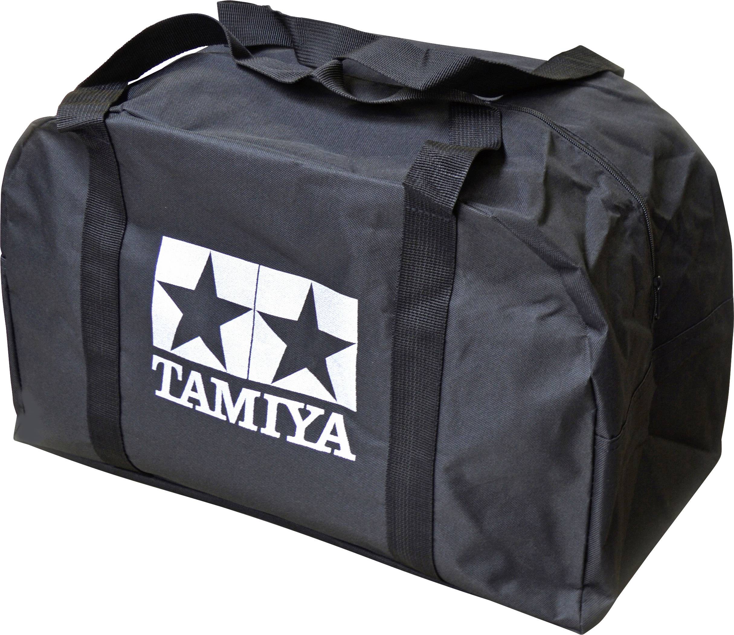 Schwarze Sporttasche mit zwei Griffen und dem weißen 'Tamiya'-Logo auf der Seite, bestehend aus zwei Sternen und dem Schriftzug.