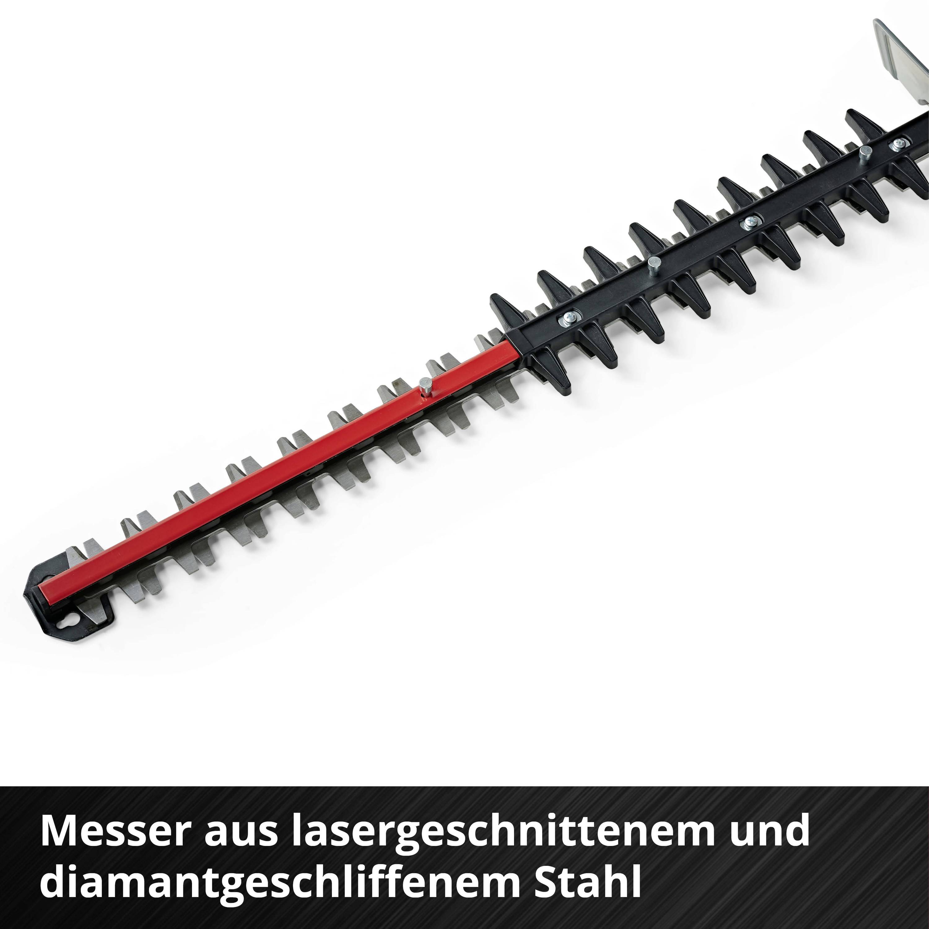 'Messer aus lasergeschnittenem und diamantgeschliffenem Stahl.' Ein langer Metallbalken mit messerähnlichen Klingen an den Seiten.