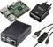 'Raspberry Pi mit Netzteil, Gehäuse und USB-Kabel mit Ein/Aus-Schalter. Ideal für DIY-Technikprojekte und elektronische Experimente.'