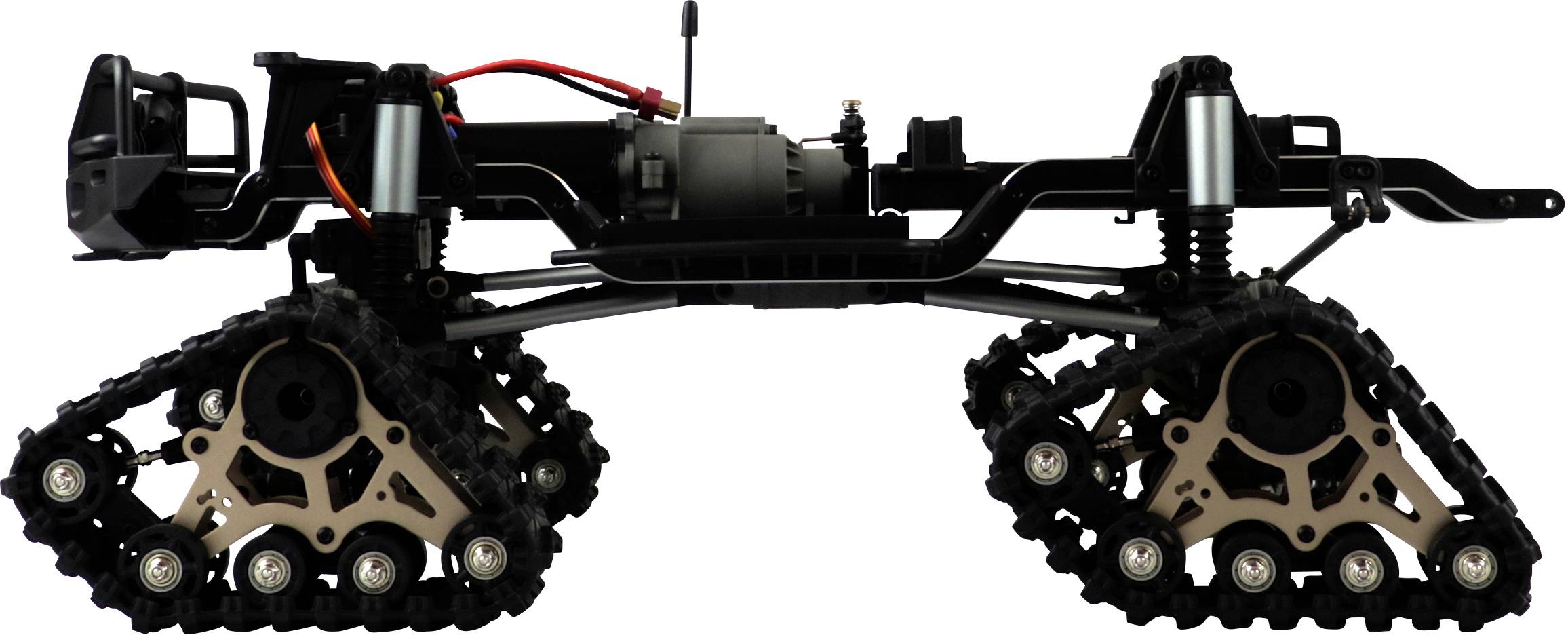 Ein Modell eines Geländefahrzeug-Chassis mit Kettenantrieb und Stoßdämpfern, seitlich betrachtet, ohne Karosserie oder Aufbauten.