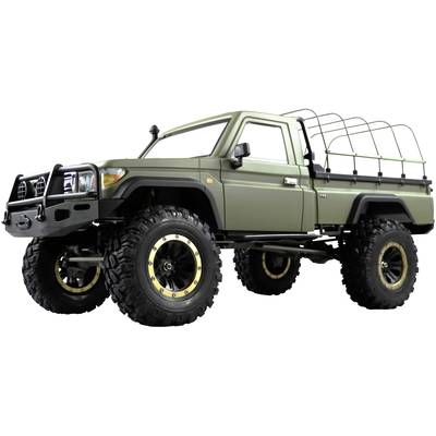 Ein olivgrüner, robuster Offroad-Pickup mit großen Geländereifen und Schutzbügeln, geeignet für schwieriges Gelände und Abenteuer.
