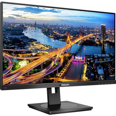 Computerbildschirm mit farbenfroher Ansicht einer beleuchteten Stadt bei Nacht, im Vordergrund ein geschwungenes Brückennetzwerk.