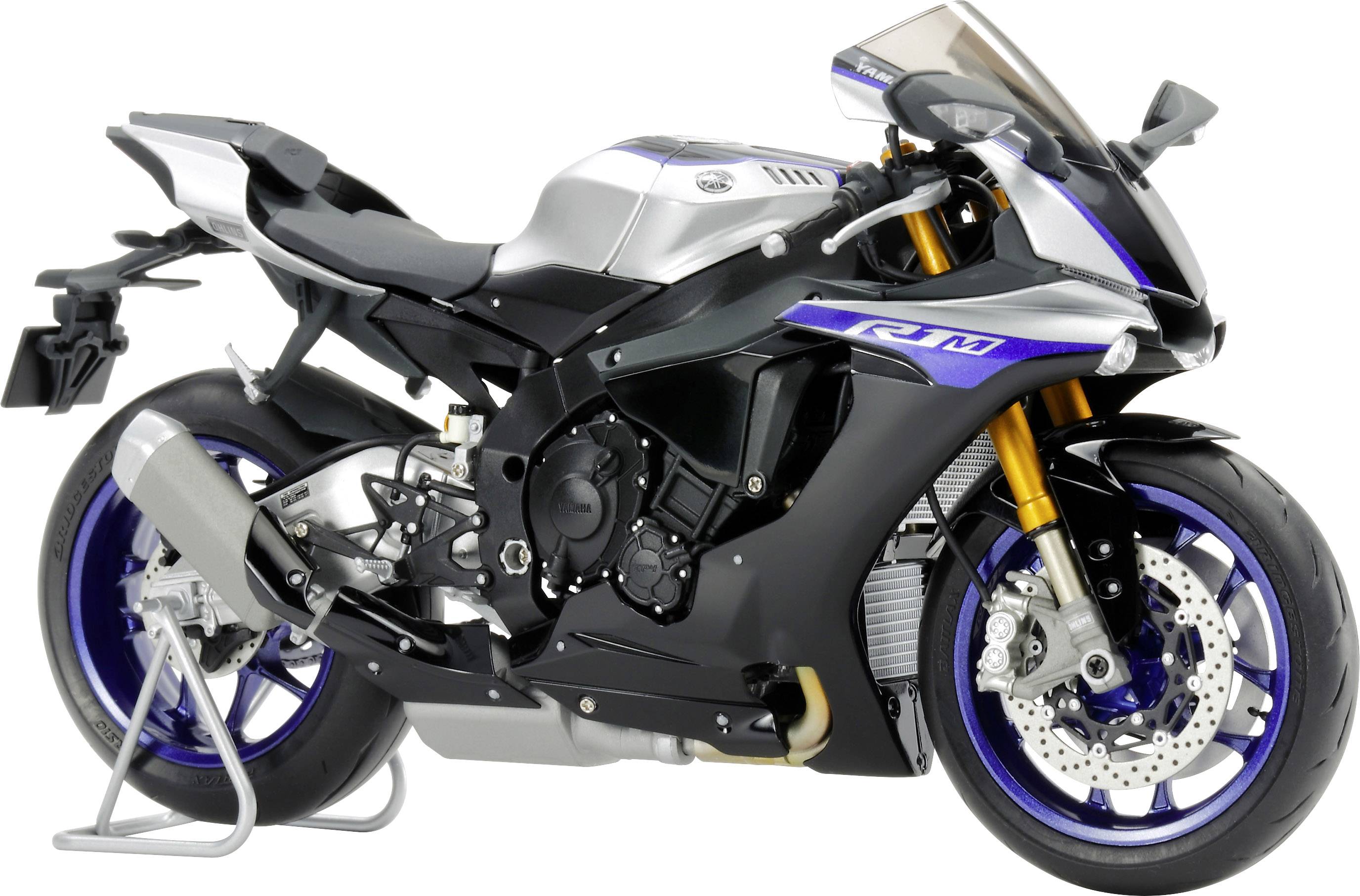 Ein Sportmotorrad mit schlankem Design und blauen Akzenten steht auf einem Ständer. Es verfügt über große Bremsscheiben und eine aerodynamische Form.