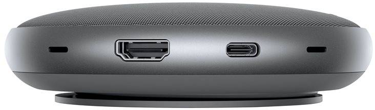 Kleiner, runder, grauer Bluetooth-Lautsprecher mit zwei Anschlussmöglichkeiten an der Seite.