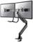 Ein doppelter Monitorhalterarm aus Metall, montiert an einer Tischkante, hält zwei Bildschirme nebeneinander auf Augenhöhe.